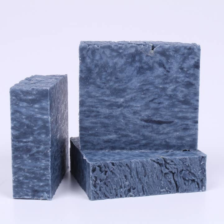 image of three blue marbled homemade soap bars.