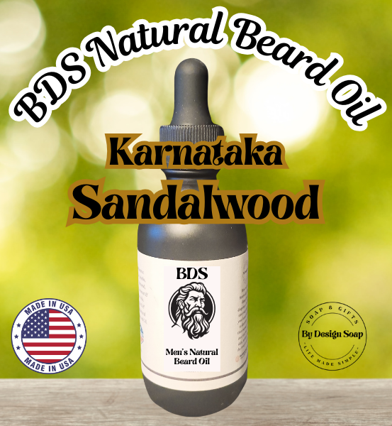 Advertisement for 'Karnataka Sandalwood' Natural Beard Oil on a blurred green background. Made in the USA label.