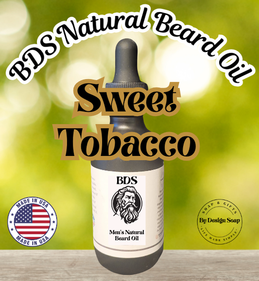 Image of a Bottle of BDS Natural Beard Oil Sweet Tobacco flavor on a wooden surface with a blurred green background and a made in the USA label.