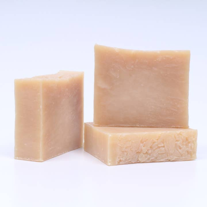 Image of three natural homemade soaps on a white background.
