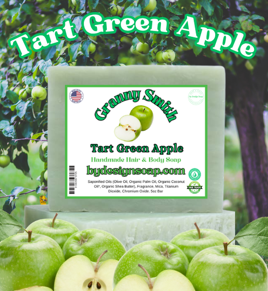 Advertisement for 'GRANNY SMITH' TART GREEN APPLE hair and body soap with a background of an apple tree and green apples. Handmade and MADE IN THE USA LABEL.