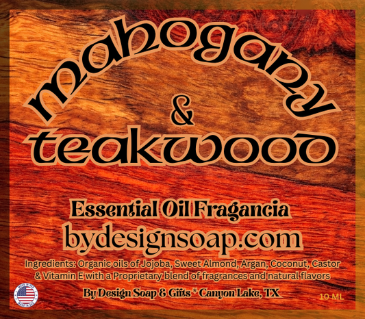 Label for Mahogany & Teakwood essential oil fragrance on a wooden background.