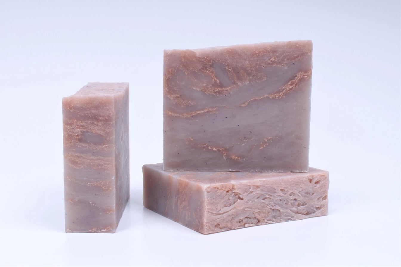 Image of three natural homemade soaps.