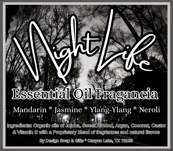 Advertisement for 'Night Life' essential oil fragrance with a black and white trees and night time skyline  background.