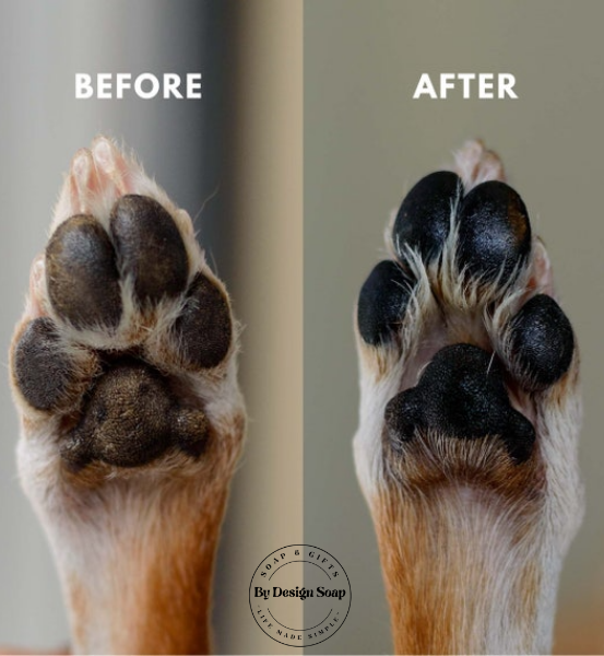 Before and after comparison of a dog's paw with visible cleaning effect, featuring 'By Design Soap' logo.