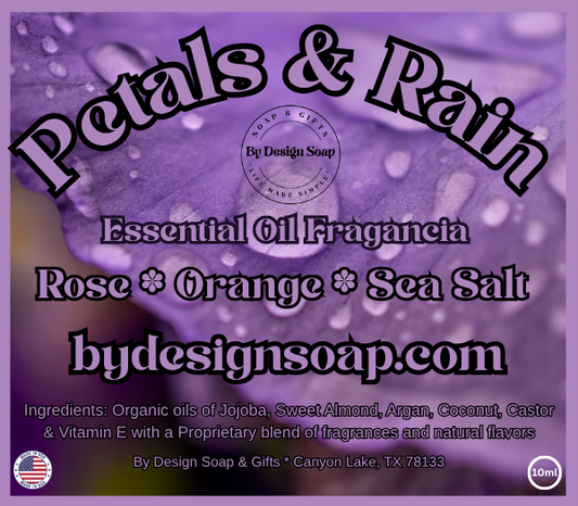 Advertisement for 'Petals & Rain' Essential Oil Fragrance with a purple background with water droplets. made in the USA label.