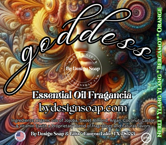 Advertisement for 'goddess' Essential Oil Fragrance with the image of a colorful abstract woman's face in the background. Made in the USA label.